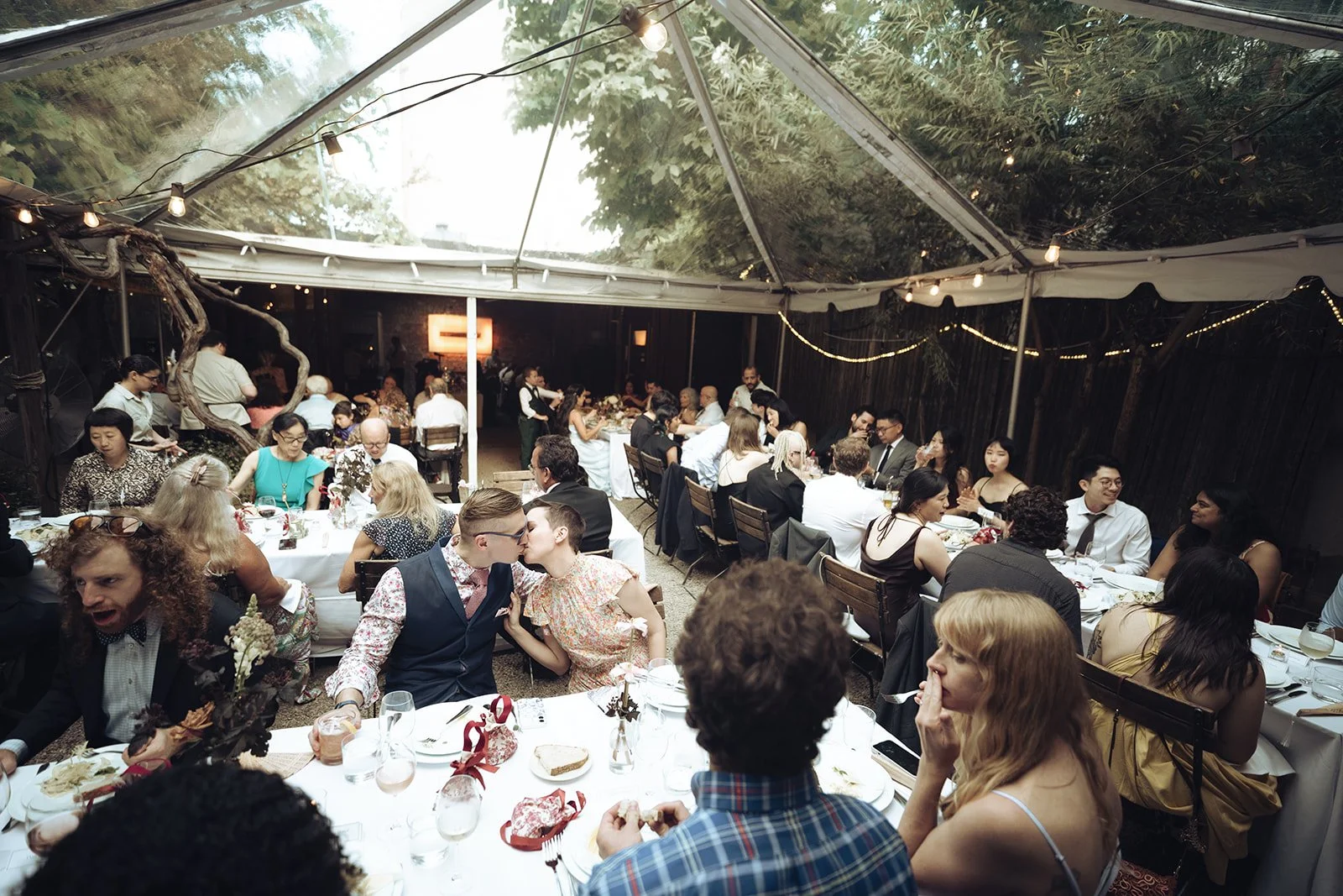  Frankies Spuntino Brooklyn wedding ceremony showing couple walking down aisle together hand in hand captured by wedding photographer 